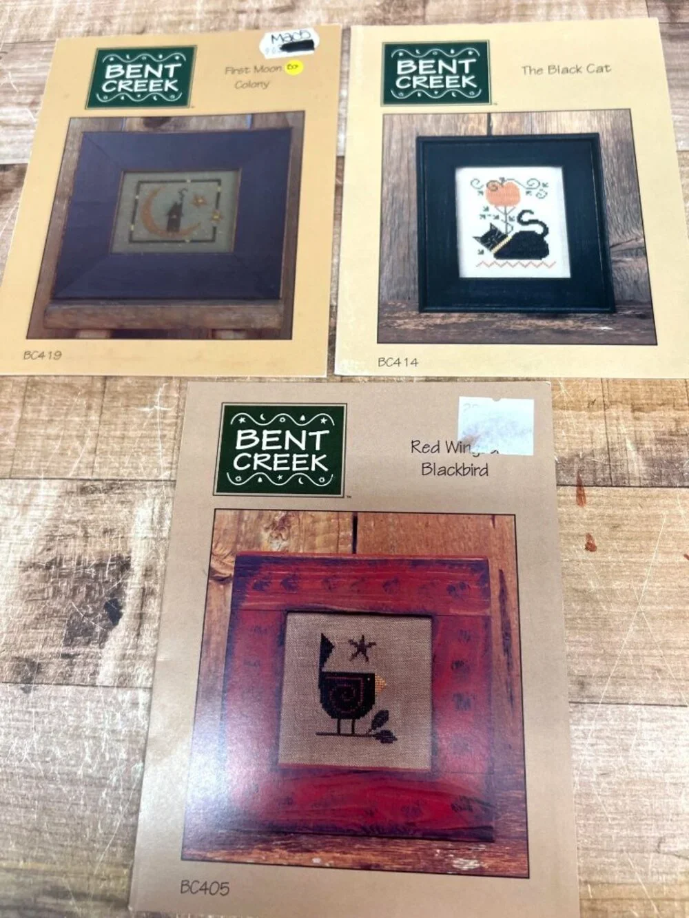 Bent Creek Cross-Stitch Patterns - First Moon Colony The Black Cat Red Winged Bl